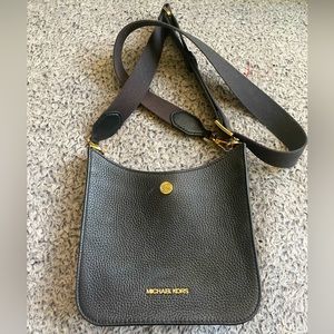 MK Michael Kors black pebbled leather cross body with canvas strap